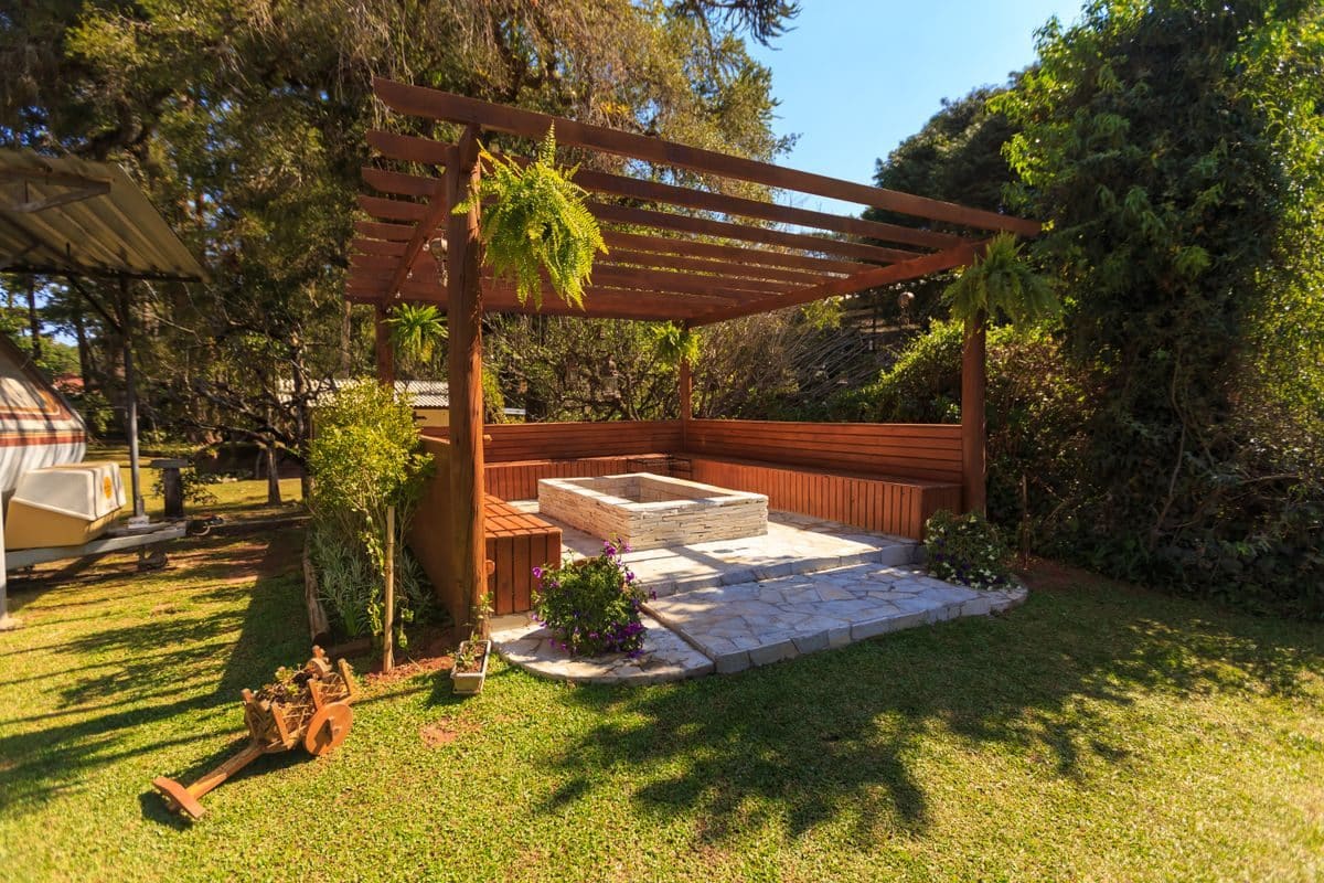 A landscaped garden with a timber pergola, illustrative example